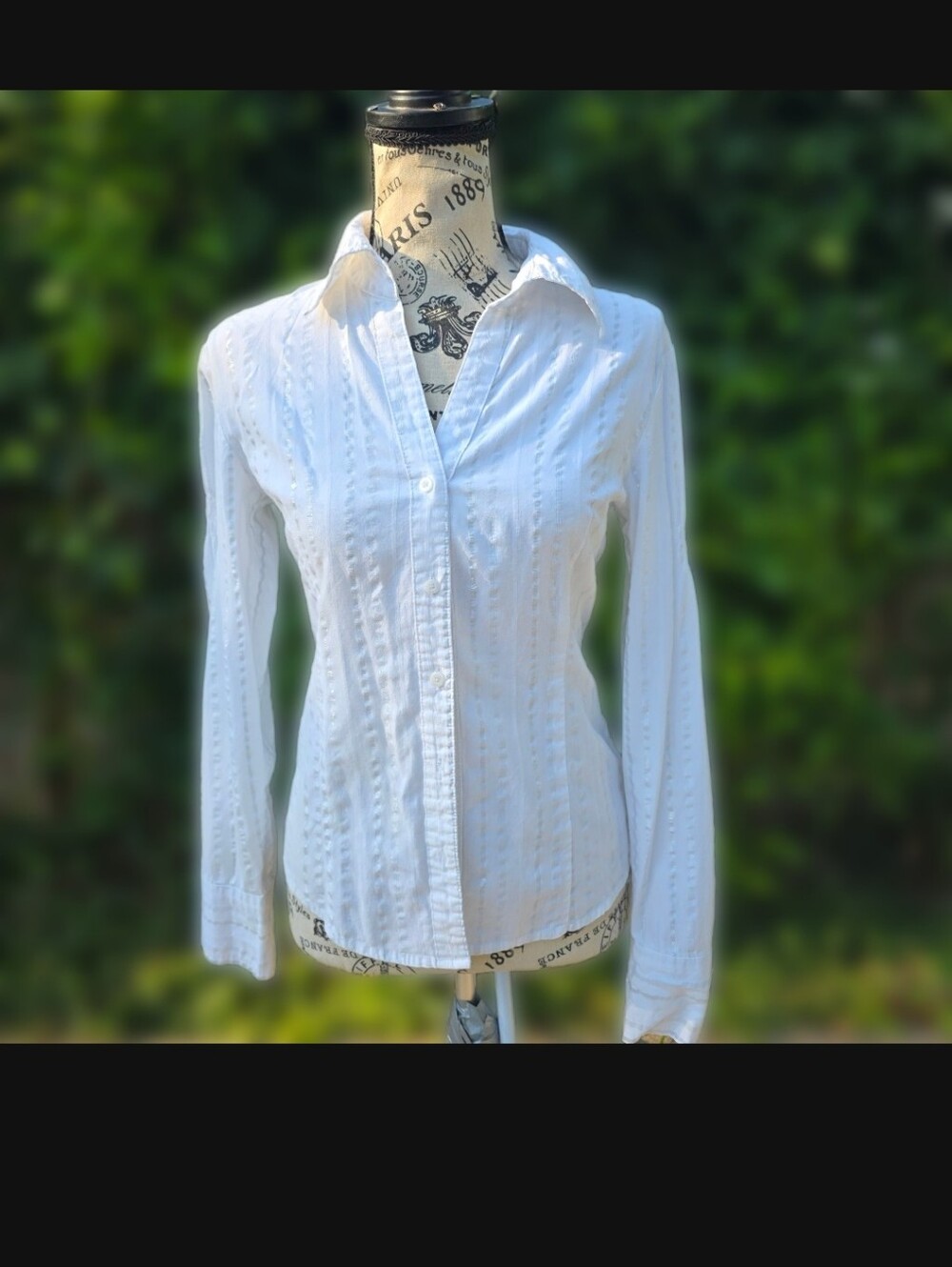 Classic and versatile white long-sleeve button-down shirt from So... Wear It Dec